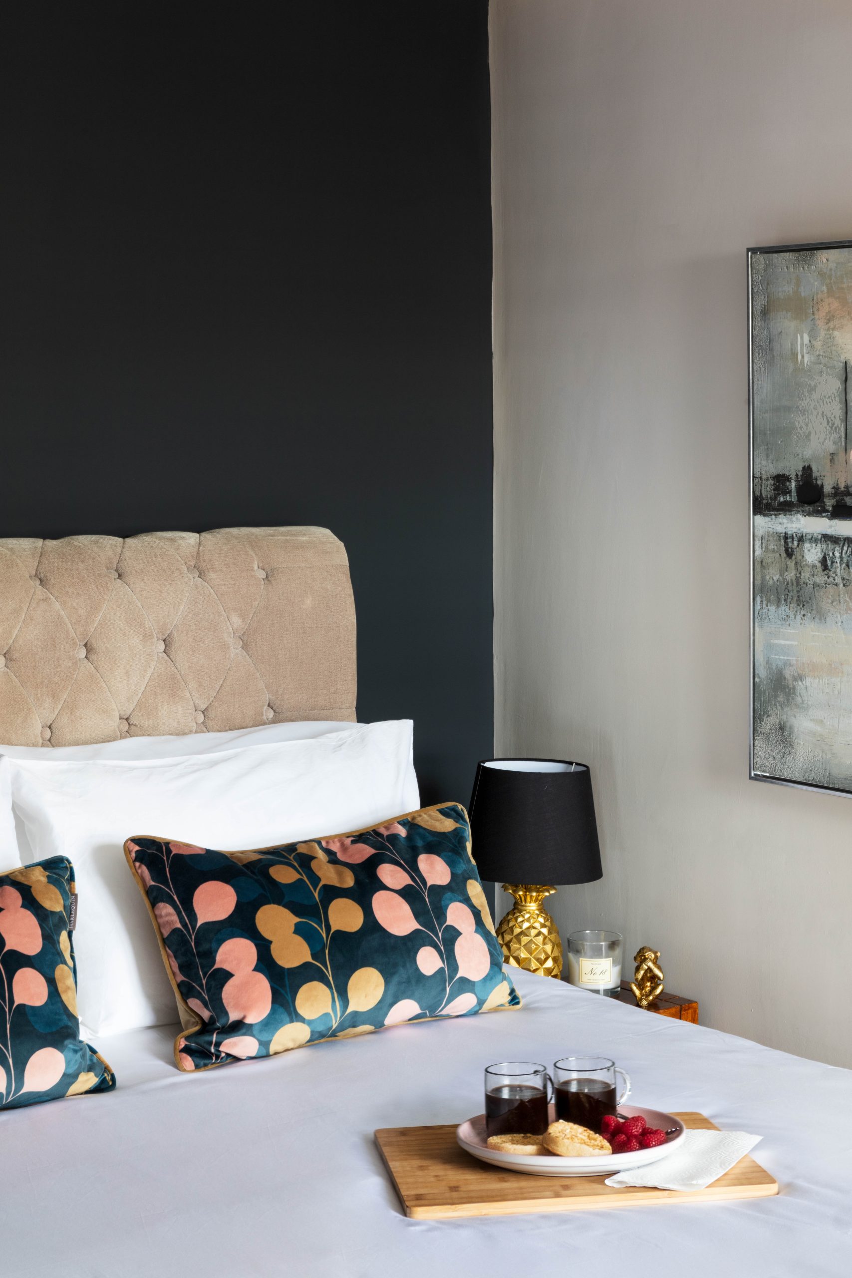 bed made with navy walls