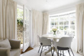 The dining area of Westgate Gallery, a luxury holiday home in Chichester, Sussex.